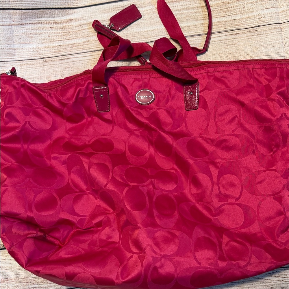 Coach weekender pink bag